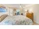 Spacious Primary bedroom with a king-size bed and built-in dresser at 3010 59Th S St # 201, Gulfport, FL 33707