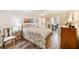 Cozy bedroom with double bed, wood dresser, and ample closet space at 3010 59Th S St # 201, Gulfport, FL 33707