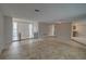 Spacious living area with tile floors and high ceilings at 3435 Roxbury Dr, Holiday, FL 34691