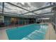 Inviting swimming pool with screened enclosure at 3435 Roxbury Dr, Holiday, FL 34691