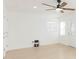 Bright living room with ceiling fan and light flooring at 3630 E North Bay St, Tampa, FL 33610