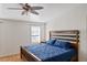 Spacious bedroom with a king-size bed and ceiling fan at 3752 Elfers Pkwy, New Port Richey, FL 34655