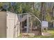 Chicken coop and storage shed in backyard at 3752 Elfers Pkwy, New Port Richey, FL 34655