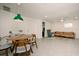 Mid century modern dining area with wood table and chairs at 4056 18Th S Ave, St Petersburg, FL 33711