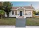 Charming bungalow with a classic facade, updated with a fresh coat of paint and landscaping at 4056 18Th S Ave, St Petersburg, FL 33711