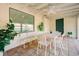 Outdoor patio with white table and chairs at 4056 18Th S Ave, St Petersburg, FL 33711