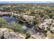 Aerial view showcasing community by the lake at 4154 Pinelake Ln # 101, Tampa, FL 33618