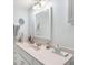 Bright bathroom with vanity, mirror, and updated fixtures at 4154 Pinelake Ln # 101, Tampa, FL 33618