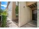 Private condo entrance with lush landscaping at 4154 Pinelake Ln # 101, Tampa, FL 33618