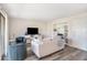 Bright living room featuring a neutral color scheme and built-in shelving at 4154 Pinelake Ln # 101, Tampa, FL 33618