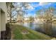 Peaceful water view with fountain and lush landscaping at 4154 Pinelake Ln # 101, Tampa, FL 33618