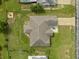 Aerial view of house roof and surrounding yard at 4522 Gondolier Rd, Spring Hill, FL 34609