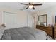 Main bedroom with dresser and ensuite bathroom access at 4522 Gondolier Rd, Spring Hill, FL 34609