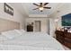 Main bedroom with king bed and walk-in closet at 4522 Gondolier Rd, Spring Hill, FL 34609