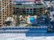 Aerial view of resort with pool and beach access at 470 Mandalay Ave # 306, Clearwater Beach, FL 33767