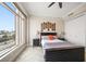 Bright bedroom with city view and large window at 470 Mandalay Ave # 306, Clearwater Beach, FL 33767