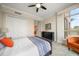 Comfortable bedroom with access to a balcony at 470 Mandalay Ave # 306, Clearwater Beach, FL 33767