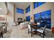 Spacious living room with city views and ample natural light at 470 Mandalay Ave # 306, Clearwater Beach, FL 33767