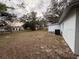 Spacious backyard offering a large grassy area at 504 Holly Ln, Brandon, FL 33510