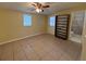 Bright bedroom with large windows and tile floor at 504 Holly Ln, Brandon, FL 33510