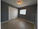 Cozy bedroom with double door closet and neutral walls at 504 Holly Ln, Brandon, FL 33510