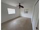 Spacious bedroom with ceiling fan and neutral walls at 504 Holly Ln, Brandon, FL 33510