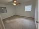 Bright bedroom featuring a ceiling fan and neutral walls at 504 Holly Ln, Brandon, FL 33510