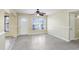 Bright living room with neutral walls, updated flooring, and ample natural light at 504 Holly Ln, Brandon, FL 33510