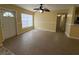 Bright living room with tile floors and ceiling fan at 504 Holly Ln, Brandon, FL 33510