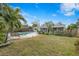 Large backyard with pool, patio, and lush landscaping at 5243 27Th N Ave, St Petersburg, FL 33710