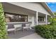 Inviting front porch with seating area and lush landscaping at 5243 27Th N Ave, St Petersburg, FL 33710