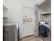 Laundry room with washer, dryer, and exterior access at 5243 27Th N Ave, St Petersburg, FL 33710