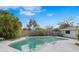 Inviting kidney-shaped pool with ample deck space at 5243 27Th N Ave, St Petersburg, FL 33710