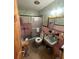 Retro pink bathroom with walk-in shower at 530 62Nd S Ave, St Petersburg, FL 33704