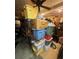 Cluttered garage with many storage containers at 530 62Nd S Ave, St Petersburg, FL 33704