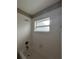 Clean bathroom with tile shower/tub combo and single window at 5352 Tangerine Dr, New Port Richey, FL 34652