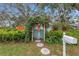 Inviting entryway with a charming arbor and a stone path at 5402 8Th S Ave, Gulfport, FL 33707