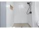 Walk-in shower with pebble floor and white tile at 5402 8Th S Ave, Gulfport, FL 33707