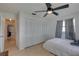 Bedroom with large closet and access to hallway at 553 Lake Hill Ln, Largo, FL 33771