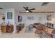 Open living space with kitchen view and exposed beams at 553 Lake Hill Ln, Largo, FL 33771