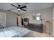 Main bedroom with built-in shelving and ensuite bathroom access at 553 Lake Hill Ln, Largo, FL 33771