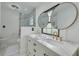 Double vanity bathroom with marble countertops at 605 7Th N St, St Petersburg, FL 33701