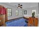 Bright bedroom with wood floors and multiple windows at 605 7Th N St, St Petersburg, FL 33701