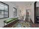 Upstairs hallway featuring built-in shelves and a bench at 605 7Th N St, St Petersburg, FL 33701