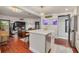 Modern kitchen with white cabinets, quartz countertops, and gold fixtures at 605 7Th N St, St Petersburg, FL 33701