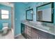 Bathroom with double vanity and granite top at 6530 Bimini Ct, Apollo Beach, FL 33572