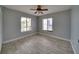 Bright bedroom with ceiling fan and tile floors at 6530 Bimini Ct, Apollo Beach, FL 33572