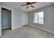 Bright bedroom with tile floors and a ceiling fan at 6530 Bimini Ct, Apollo Beach, FL 33572