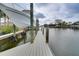 Private dock with boat lift and walkway at 6530 Bimini Ct, Apollo Beach, FL 33572