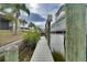 Long dock walkway leading to a boat lift at 6530 Bimini Ct, Apollo Beach, FL 33572